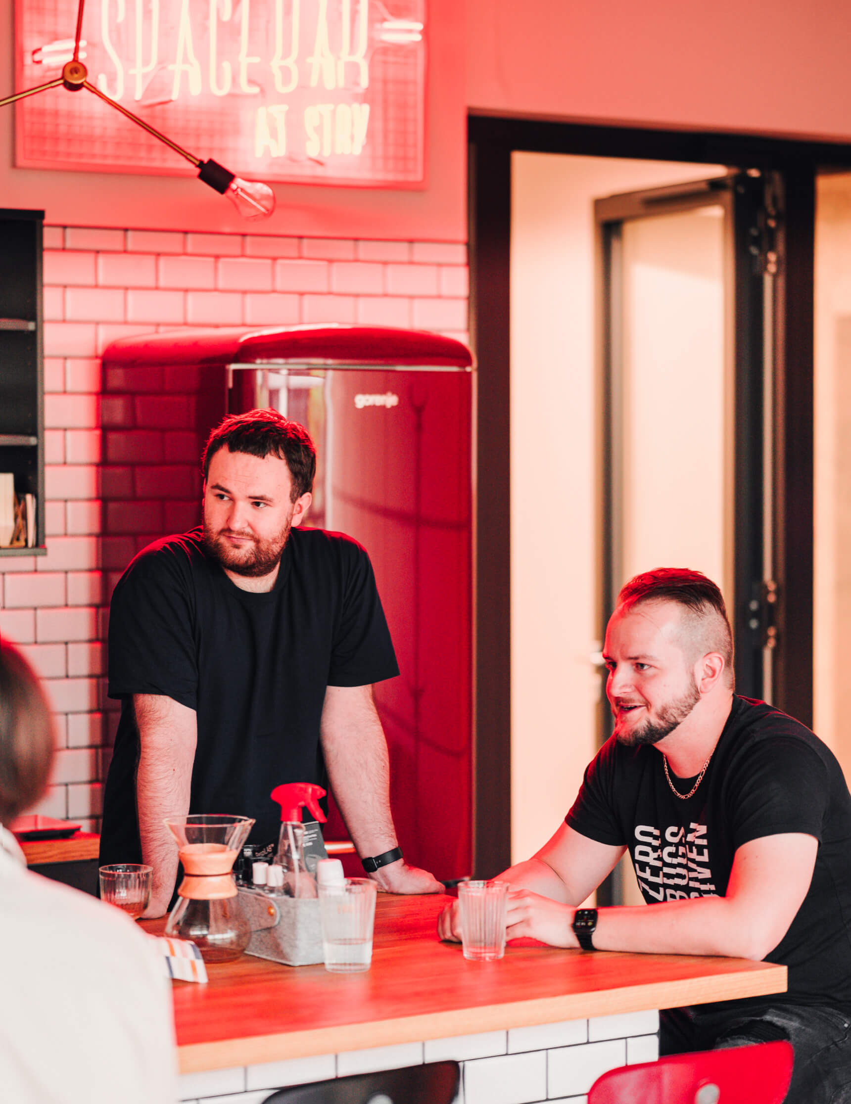 Software Engineers relaxing at company bar